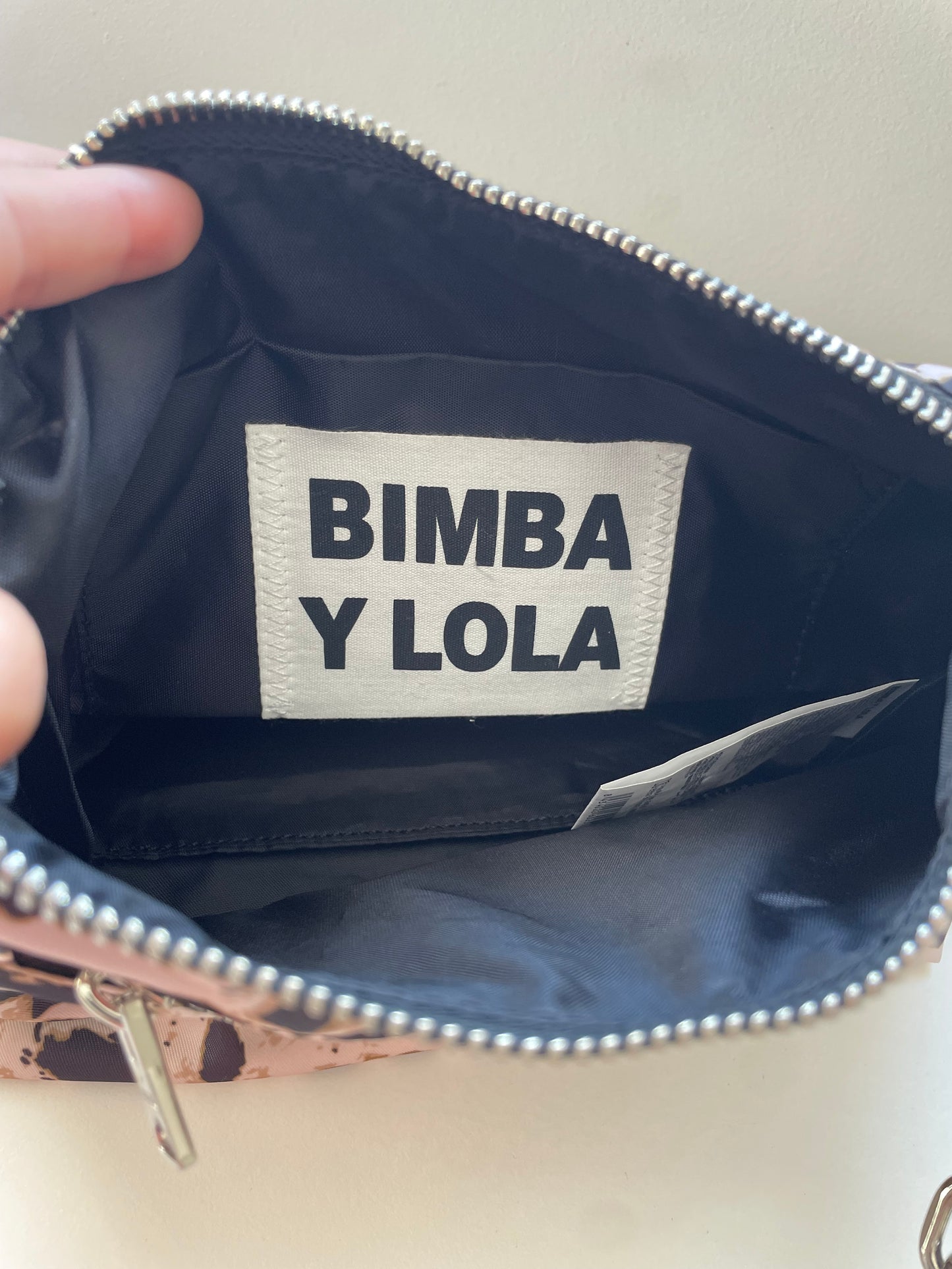 Bandolera lila Byl